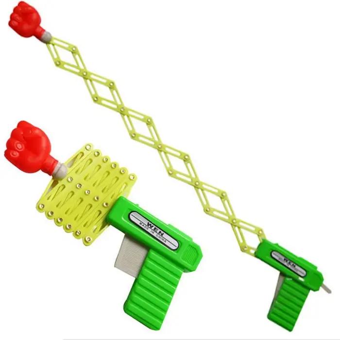 Pistolet de farce rétractable en forme de poing, jouet amusant, cadeau de festival en plastique pour