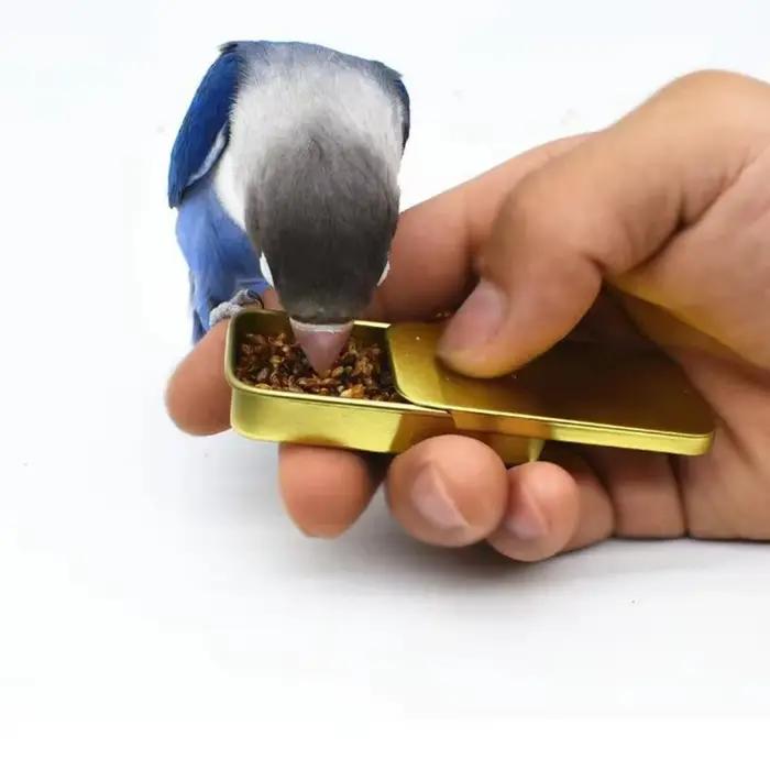 Pot de nourriture d'entraînement pour oiseaux