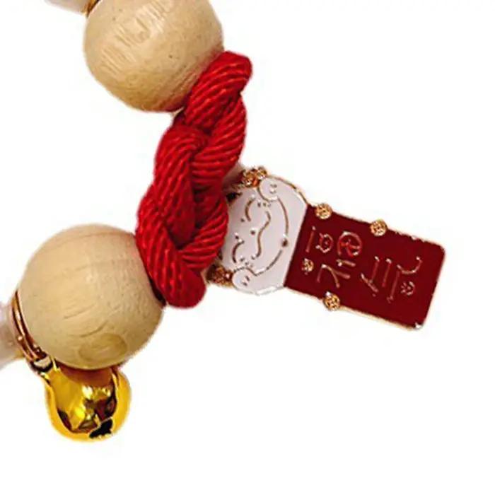 Collier anti-pouces et poux en bois de canhre