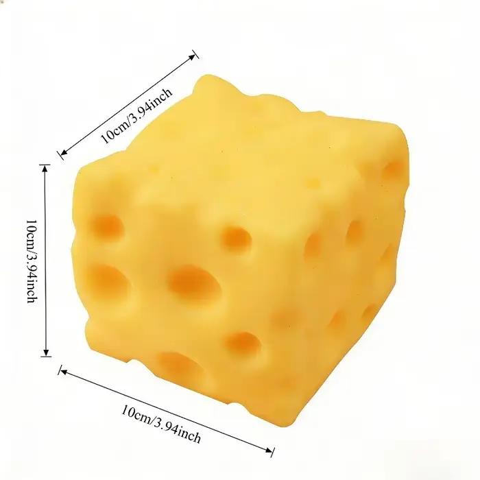 Jouet géant en forme de fromage à presser