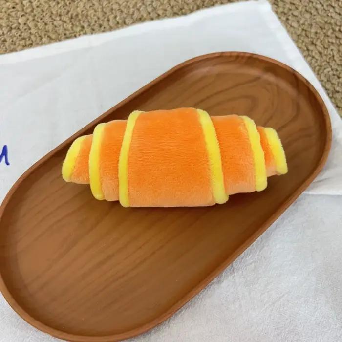 Jouet pour chien en forme de croissant souple