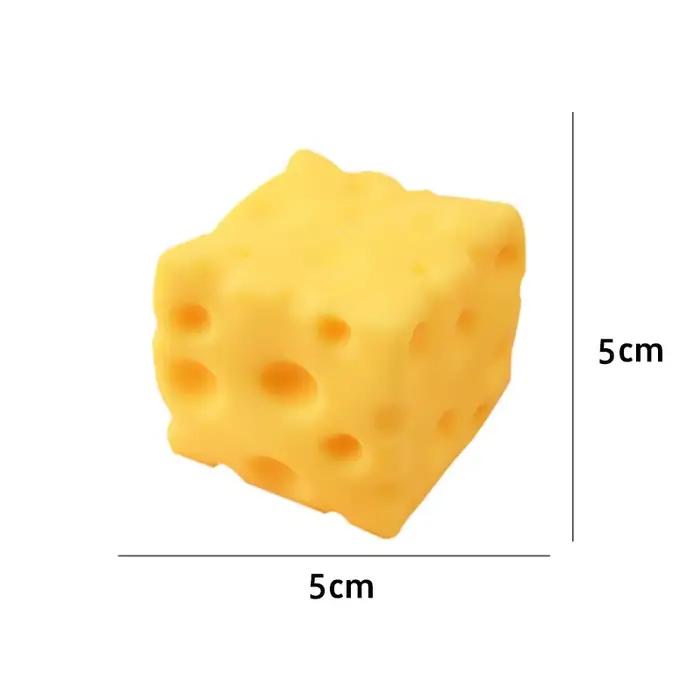 Jouet géant en forme de fromage à presser