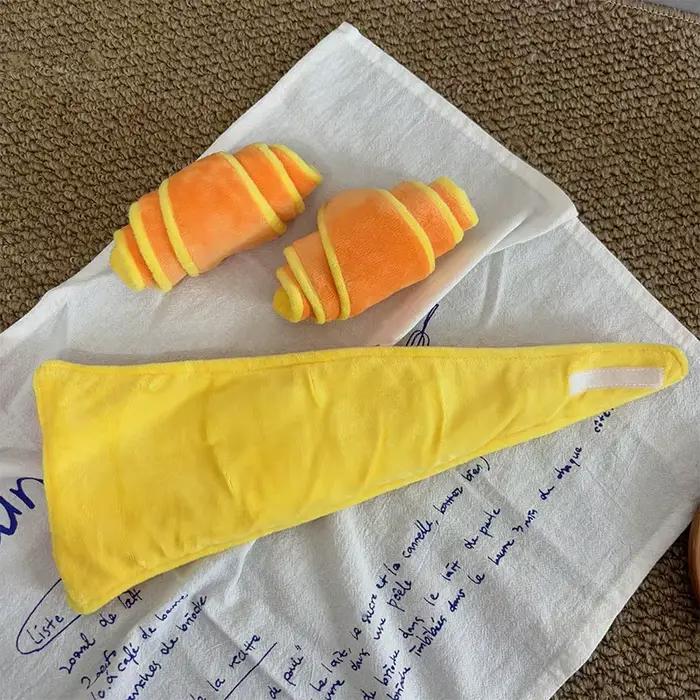 Jouet pour chien en forme de croissant souple