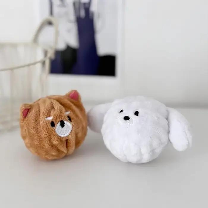 Jouet à bille pour chiot qui couine