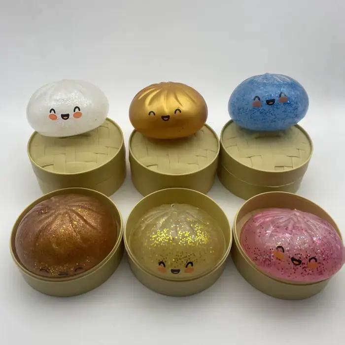 Jouet anti-stress Baozi contenant des grains de riz brillants et doux