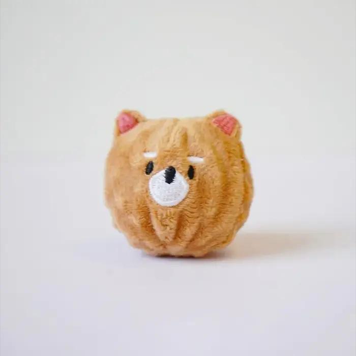 Jouet à bille pour chiot qui couine