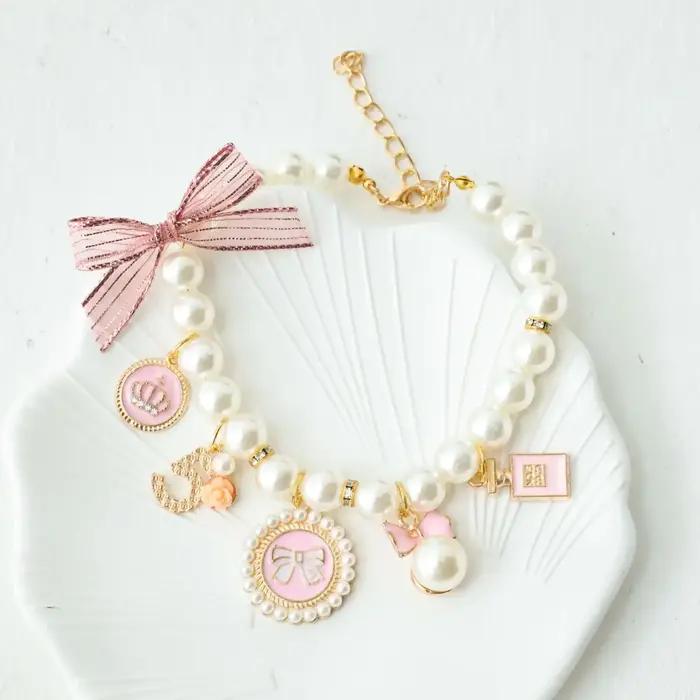 Collier de perles avec nœud pour animaux de compagnie