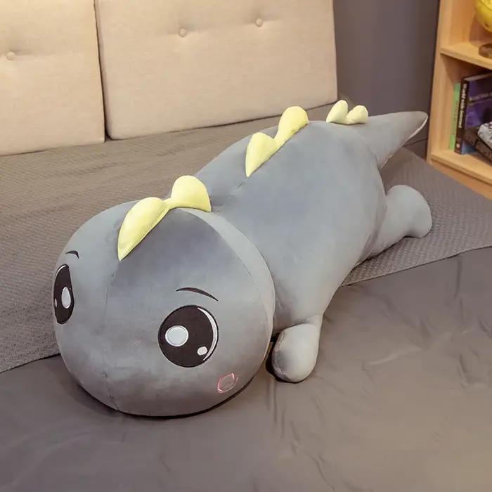 Jouet en peluche dinosaure géant à grands yeux