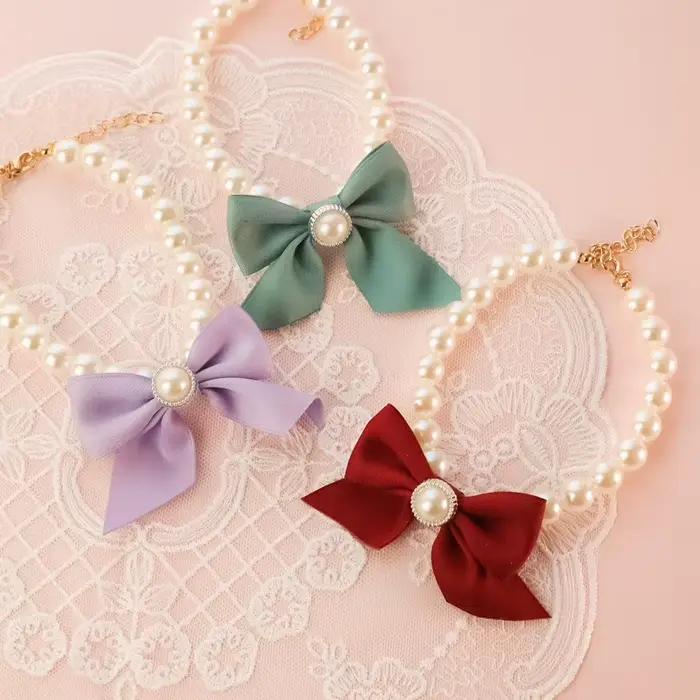 Collier avec nœud en perles pour animaux de compagnie